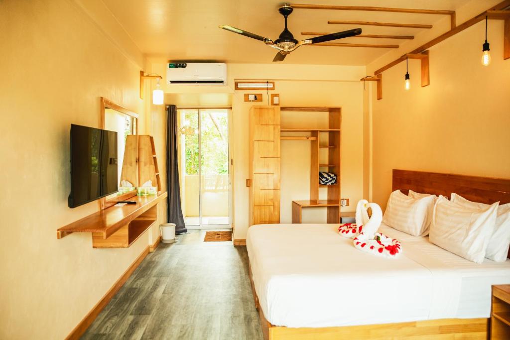 Postel nebo postele na pokoji v ubytování Relax Lodge