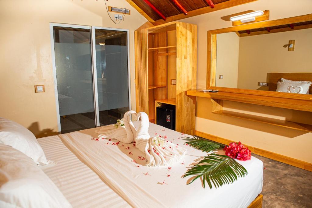 Postel nebo postele na pokoji v ubytování Relax Lodge