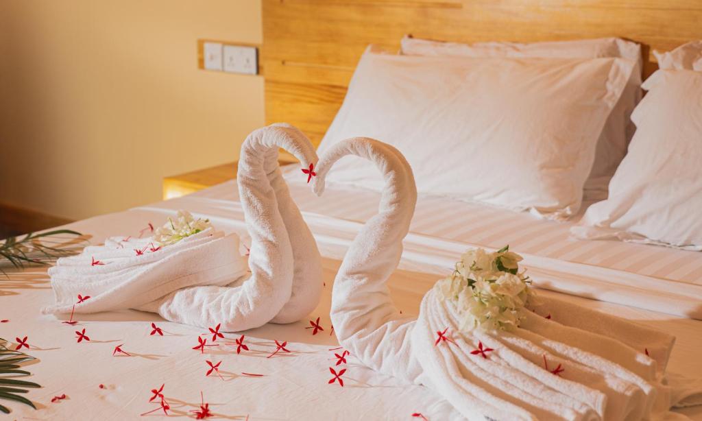 Postel nebo postele na pokoji v ubytování Relax Lodge