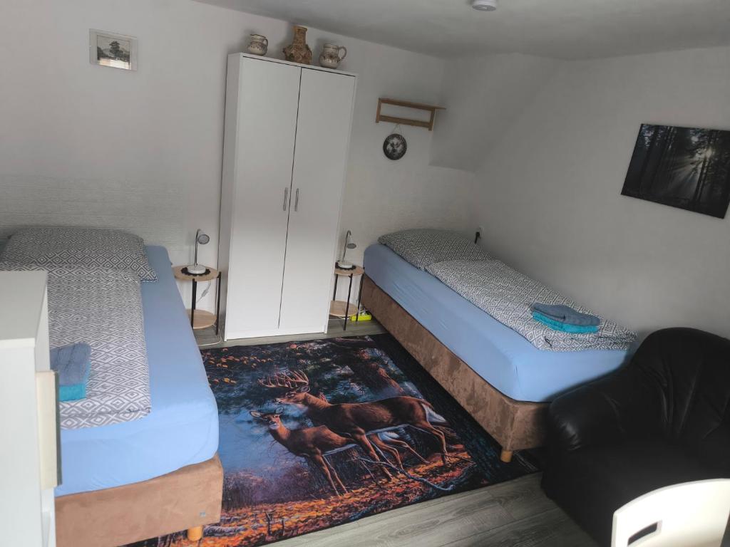 Postel nebo postele na pokoji v ubytování Ferienwohnung TAL-ECK