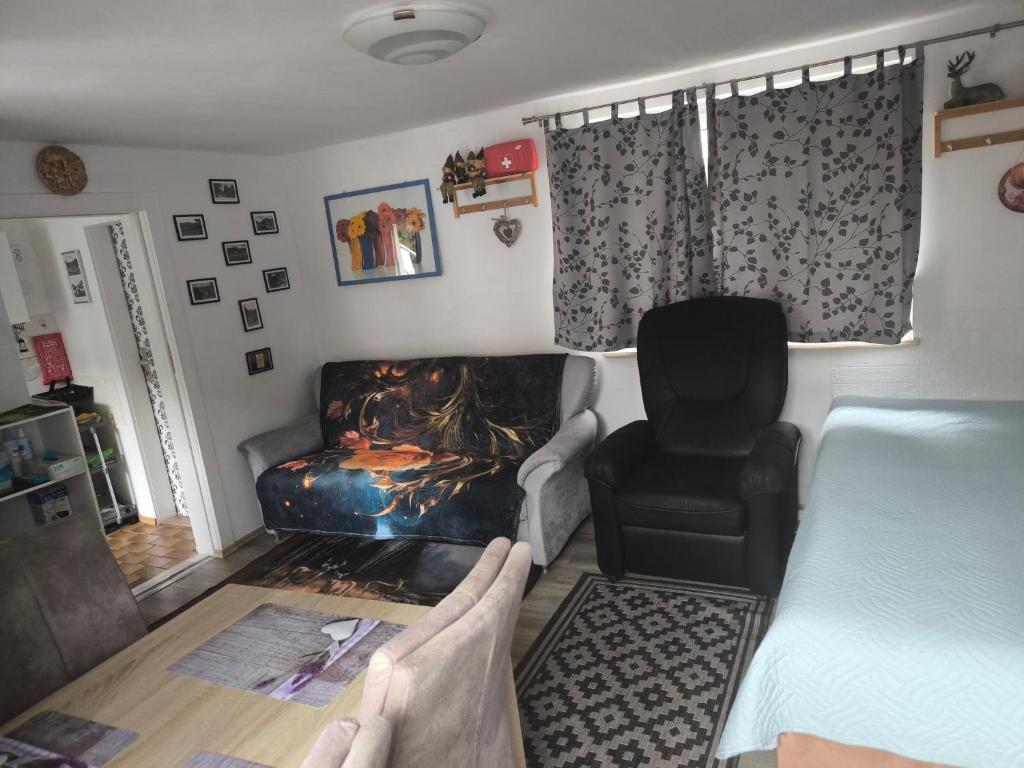 Posezení v ubytování Ferienwohnung TAL-ECK