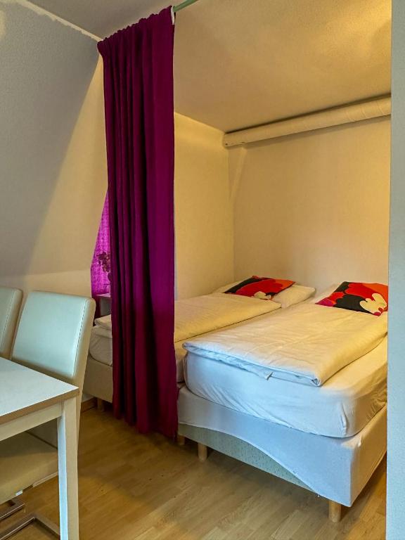 Postel nebo postele na pokoji v ubytování Nydeck