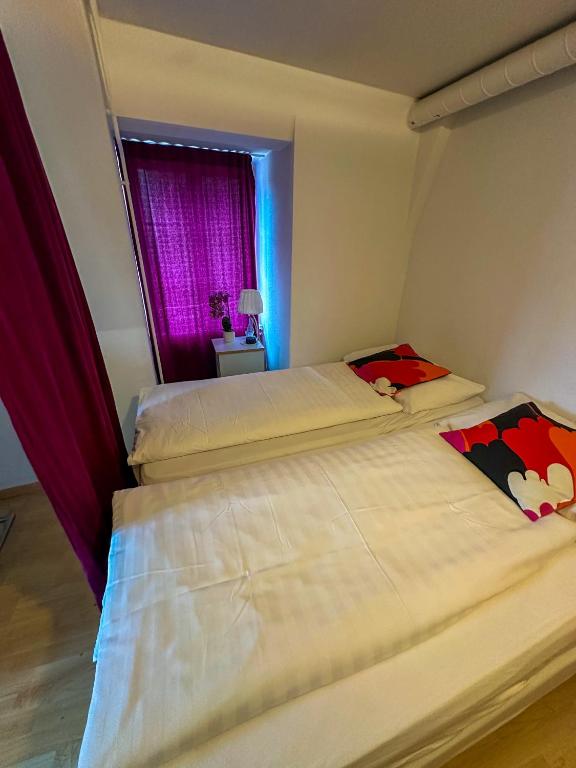 Postel nebo postele na pokoji v ubytování Nydeck