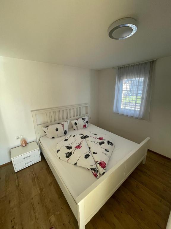 Postel nebo postele na pokoji v ubytování Alpenpanorama Oase