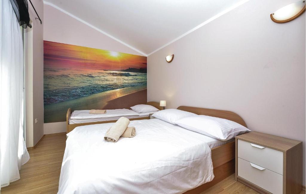 Postel nebo postele na pokoji v ubytování Holiday Home Murter 44 With Outdoor Swimmingpool