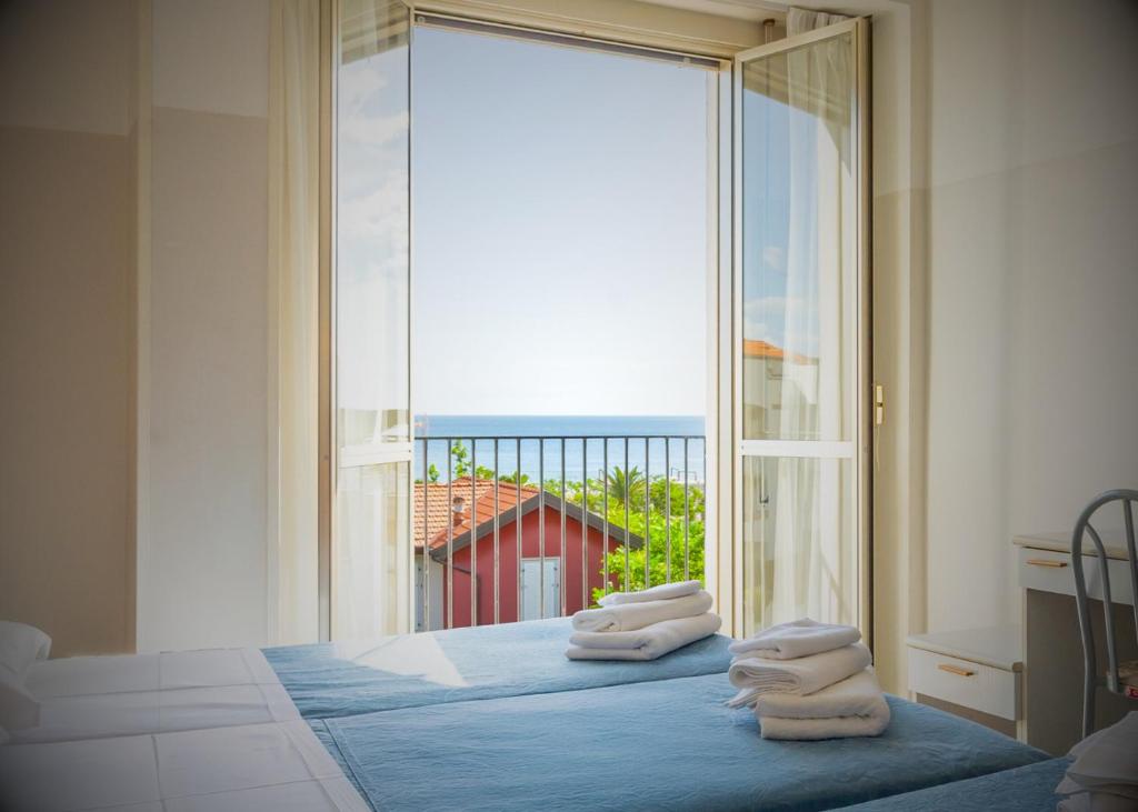 Postel nebo postele na pokoji v ubytování Hotel Selene - Vista Mare