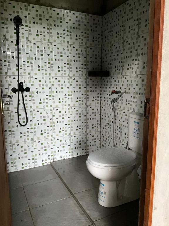 Koupelna v ubytování Aqlan Garden House