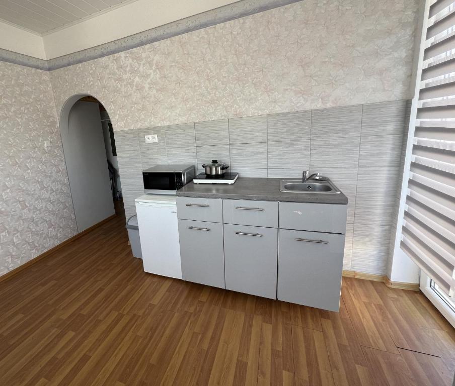 Nhà bếp/bếp nhỏ tại Ośrodek Wypoczynkowy Słońce Bobolin