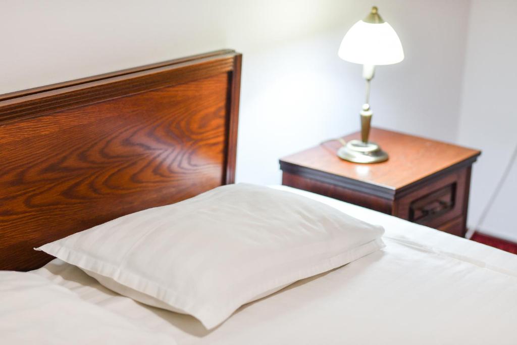 Postel nebo postele na pokoji v ubytování Hotel Elyon Dej