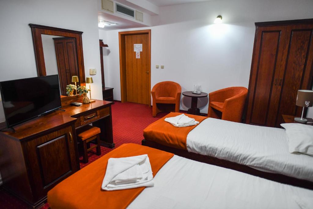 Postel nebo postele na pokoji v ubytování Hotel Elyon Dej