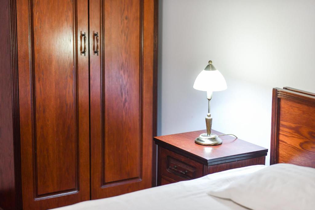 Postel nebo postele na pokoji v ubytování Hotel Elyon Dej
