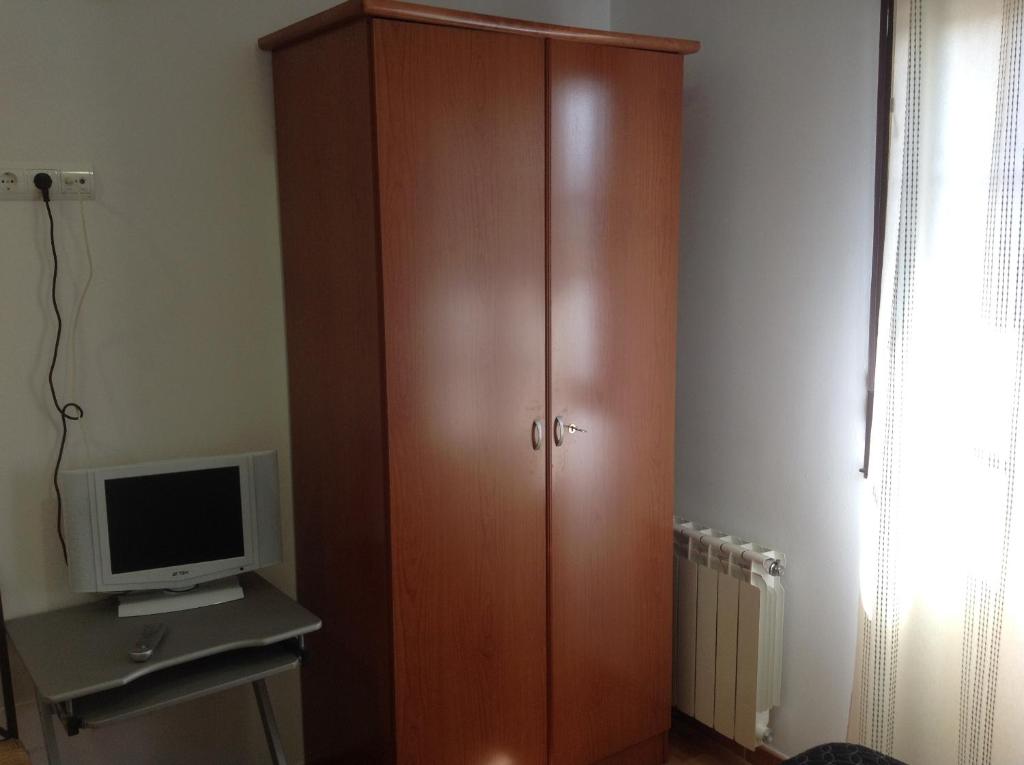 TV a/nebo společenská místnost v ubytování Hostal Las Eras