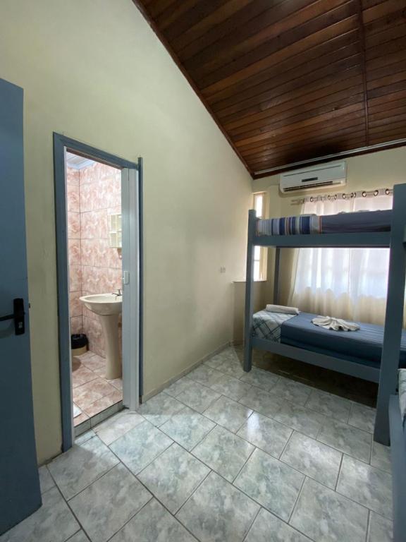 Postel nebo postele na pokoji v ubytování Hotel Morada de Leste Pontal