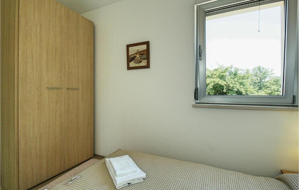 Posteľ alebo postele v izbe v ubytovaní 3 Bedroom Gorgeous Home In Sv,ivan