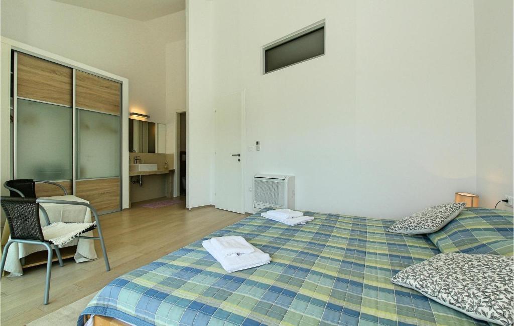 Posteľ alebo postele v izbe v ubytovaní 3 Bedroom Gorgeous Home In Sv,ivan