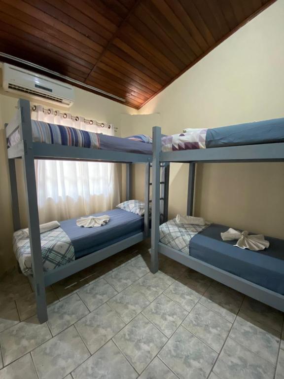 Postel nebo postele na pokoji v ubytování Hotel Morada de Leste Pontal