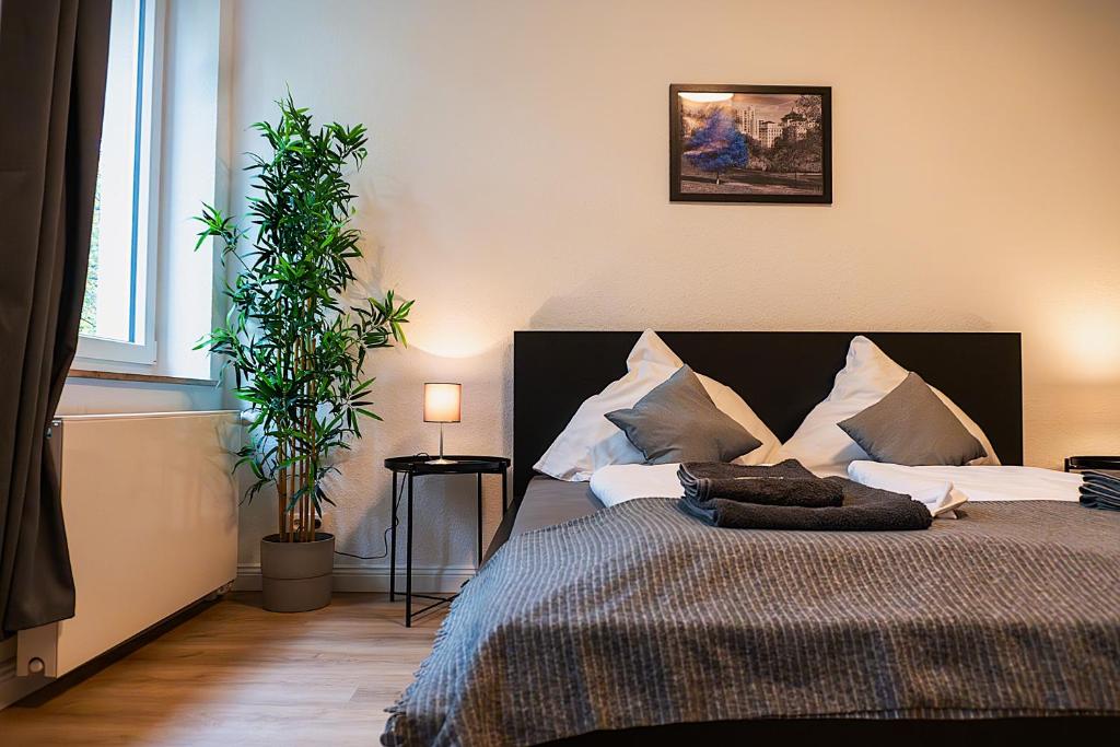 Katil atau katil-katil dalam bilik di LiRo Apartments Lohscheidt Mülheim