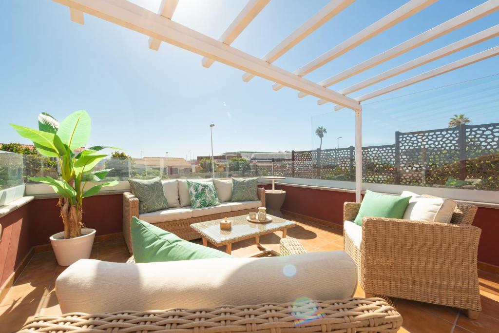 Posezení v ubytování Chalé con terraza en la costa