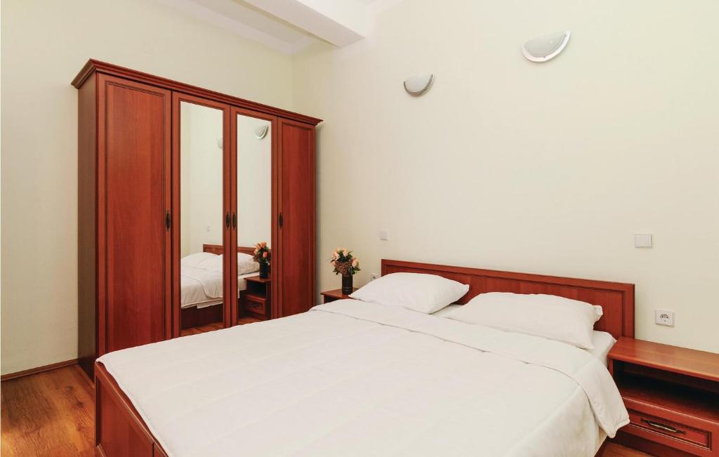 Posteľ alebo postele v izbe v ubytovaní Apartment Ribnica-Krusevo With Sea View Viii
