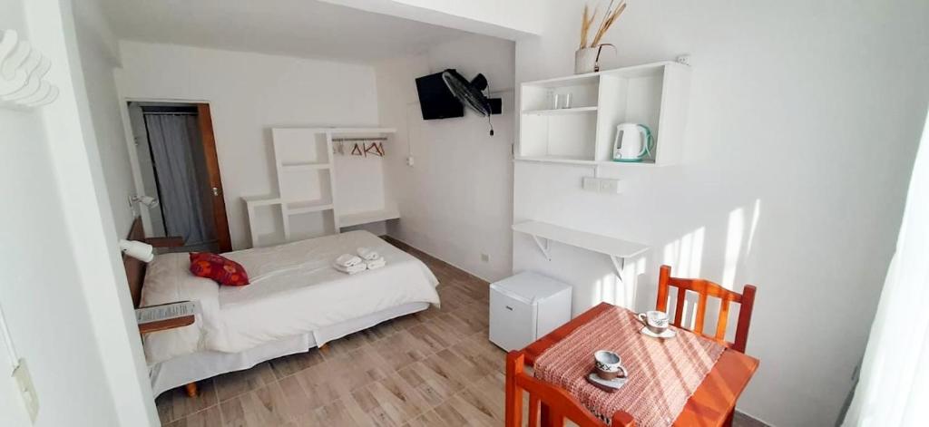 En eller flere senge i et værelse på Casa de mar