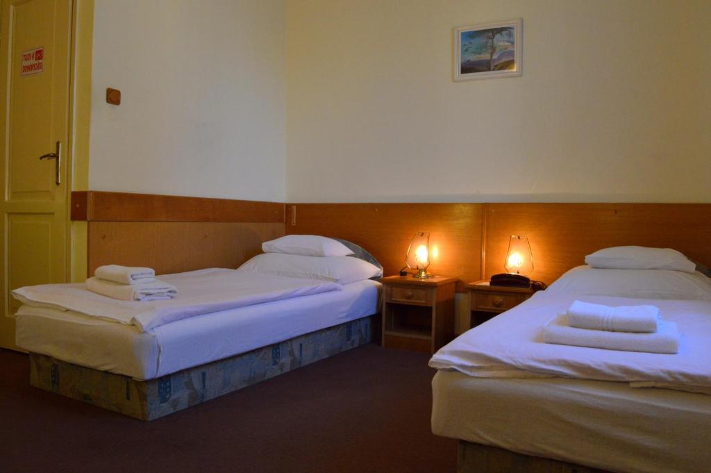 Postel nebo postele na pokoji v ubytování Apollo Motel