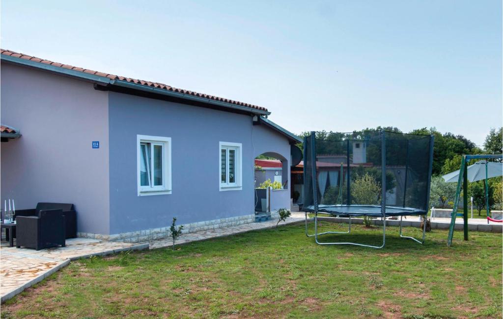 Zahrada ubytování Two-Bedroom Holiday Home In Valtura