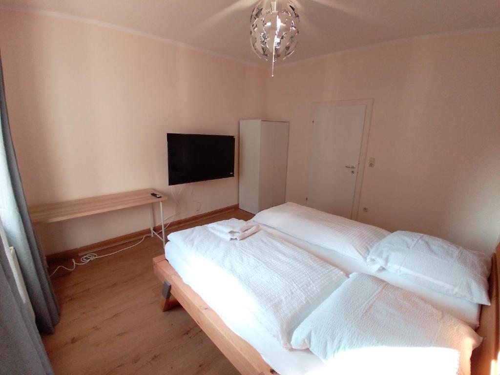 Postel nebo postele na pokoji v ubytování Apartments im Mardefeldpalais