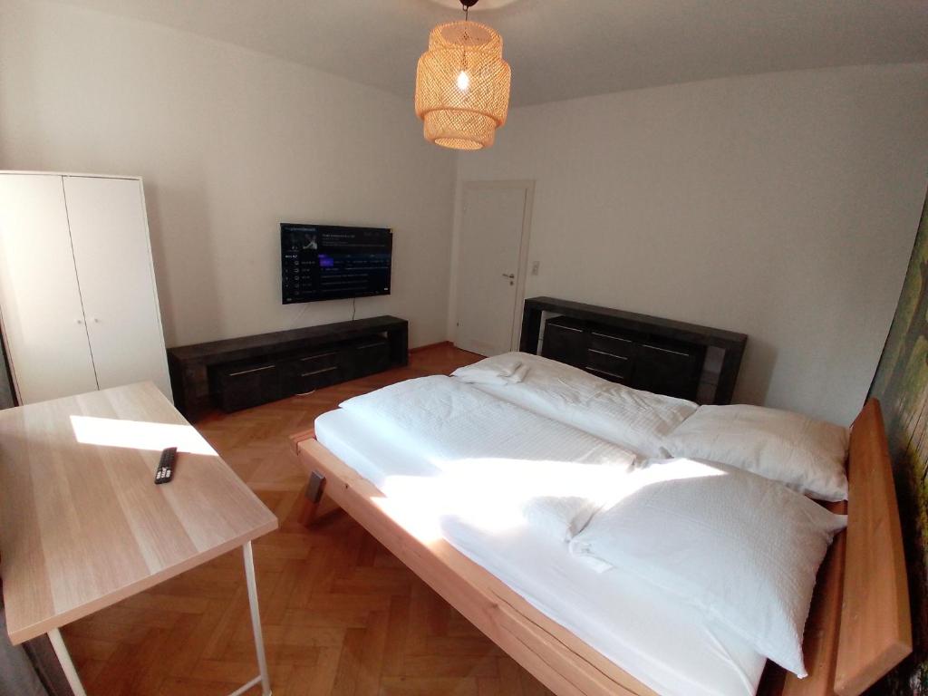 Postel nebo postele na pokoji v ubytování Apartments im Mardefeldpalais