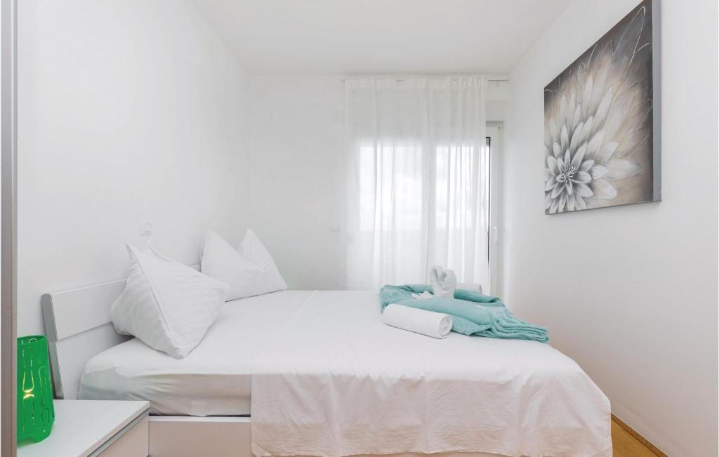 Posteľ alebo postele v izbe v ubytovaní Nice Apartment In Crikvenica