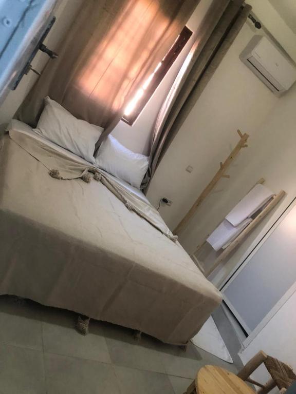 Postel nebo postele na pokoji v ubytování Riad Nomad House Marrakech