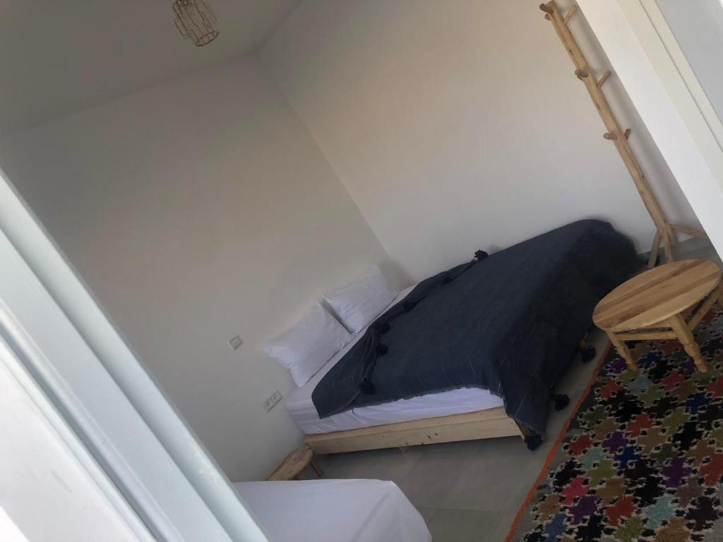 Postel nebo postele na pokoji v ubytování Riad Nomad House Marrakech
