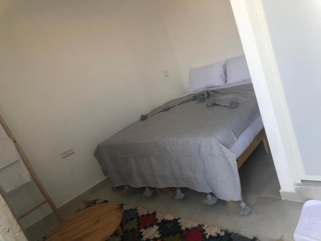 Postel nebo postele na pokoji v ubytování Riad Nomad House Marrakech