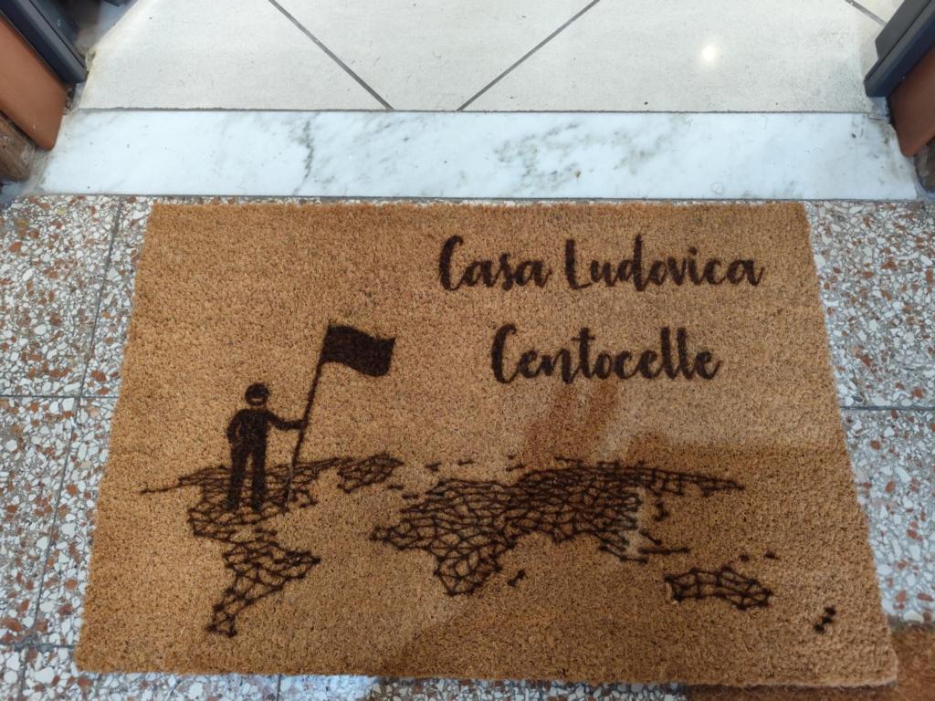 a drawing of a man holding a flag on a floor at Casa Ludovica Centocelle in Rome