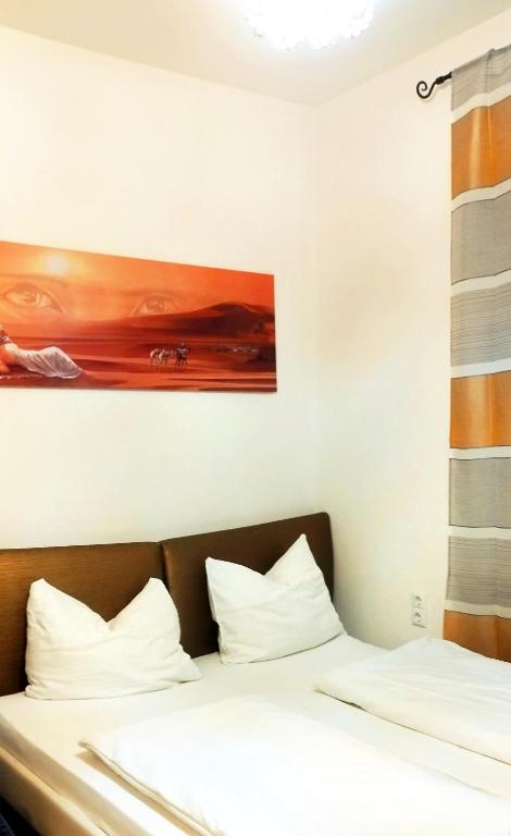Postel nebo postele na pokoji v ubytování Ferienwohnung Stainach