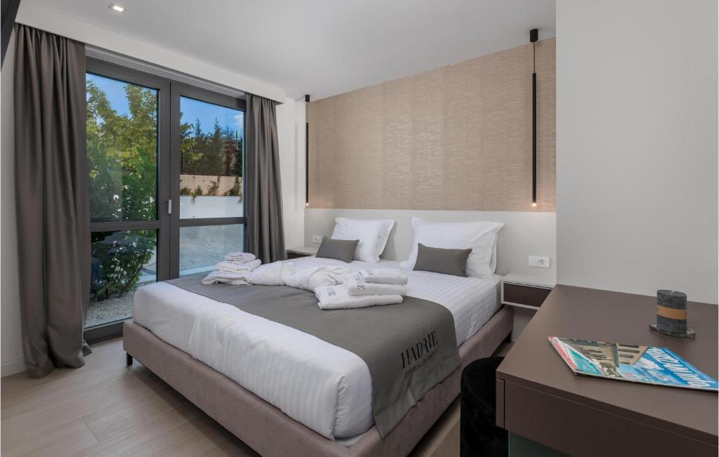 Posteľ alebo postele v izbe v ubytovaní Pet Friendly Apartment In Krk With Wifi