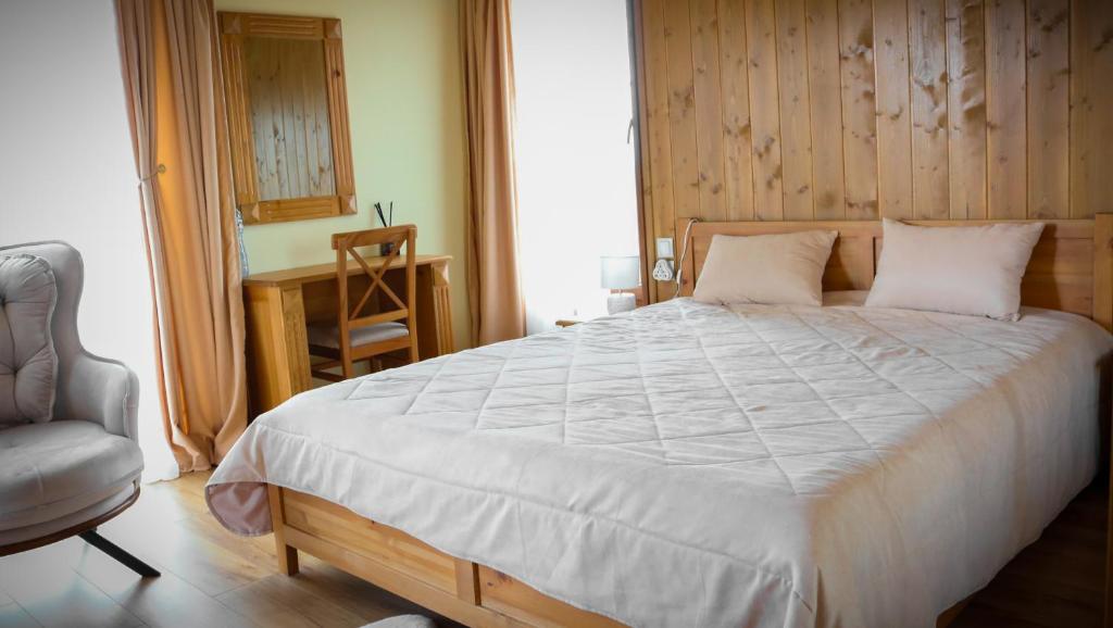 Postel nebo postele na pokoji v ubytování Pirin Golf Villa Relax