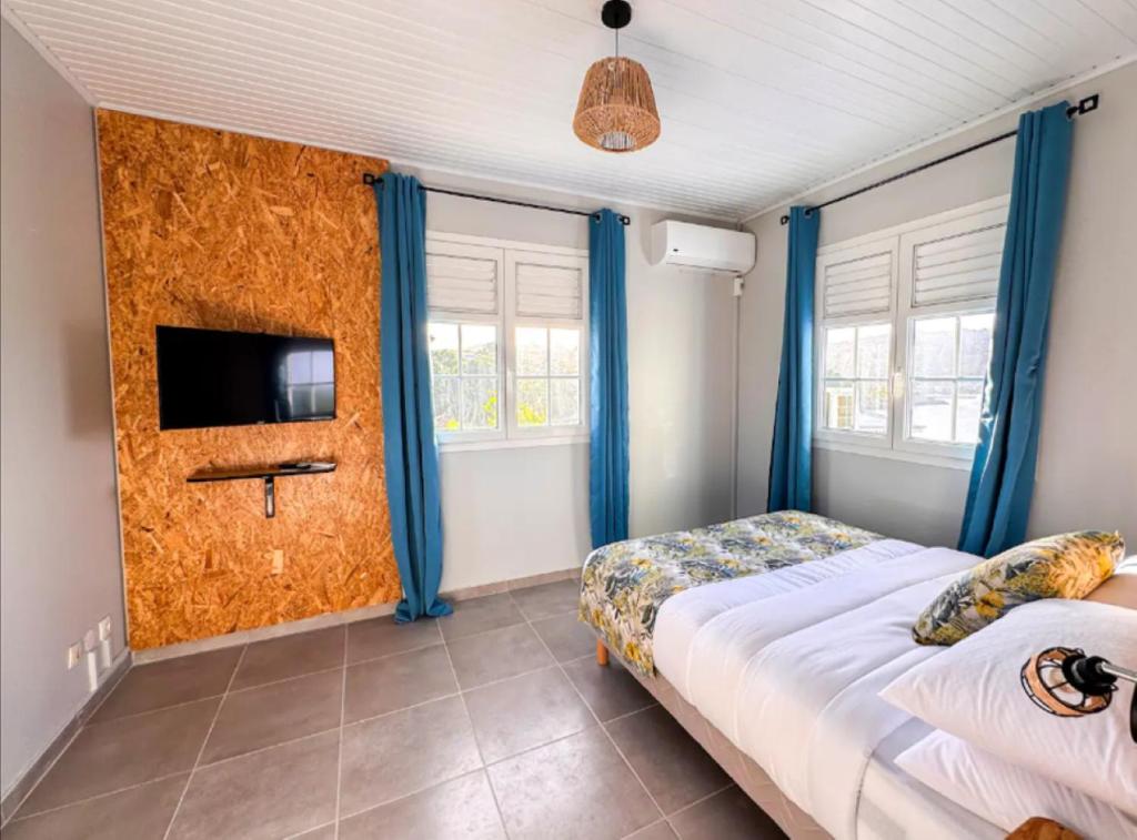 Postel nebo postele na pokoji v ubytování Villa Pool & Beach Martinique