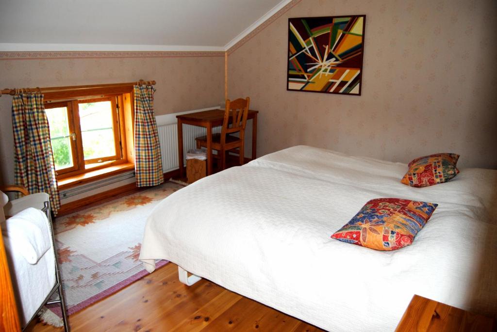 Postel nebo postele na pokoji v ubytování Tingvall B&B Eco-Lodge