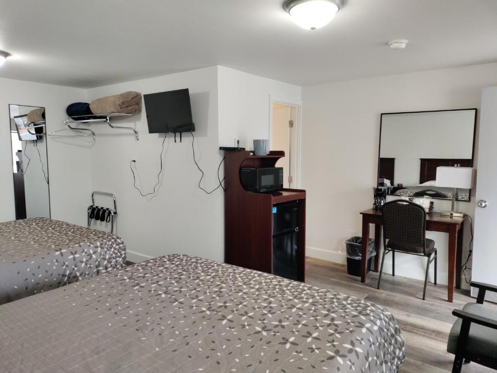 Kuchyň nebo kuchyňský kout v ubytování Eight Bar B Motel
