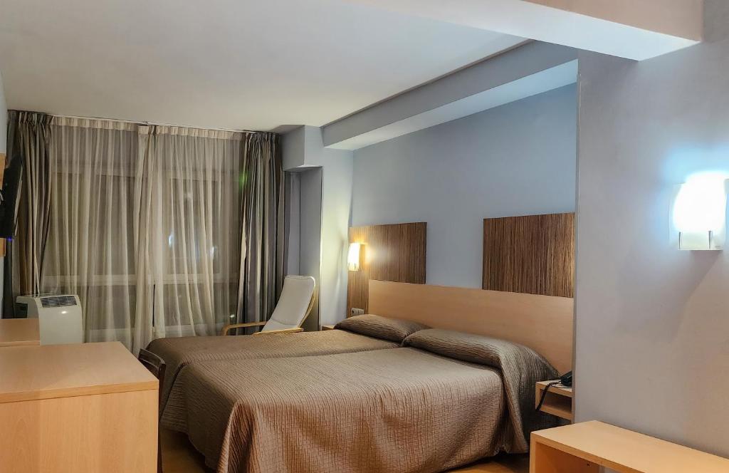 Postel nebo postele na pokoji v ubytování Hotel Faranda Alisas Santander, Ascend Hotel Collection