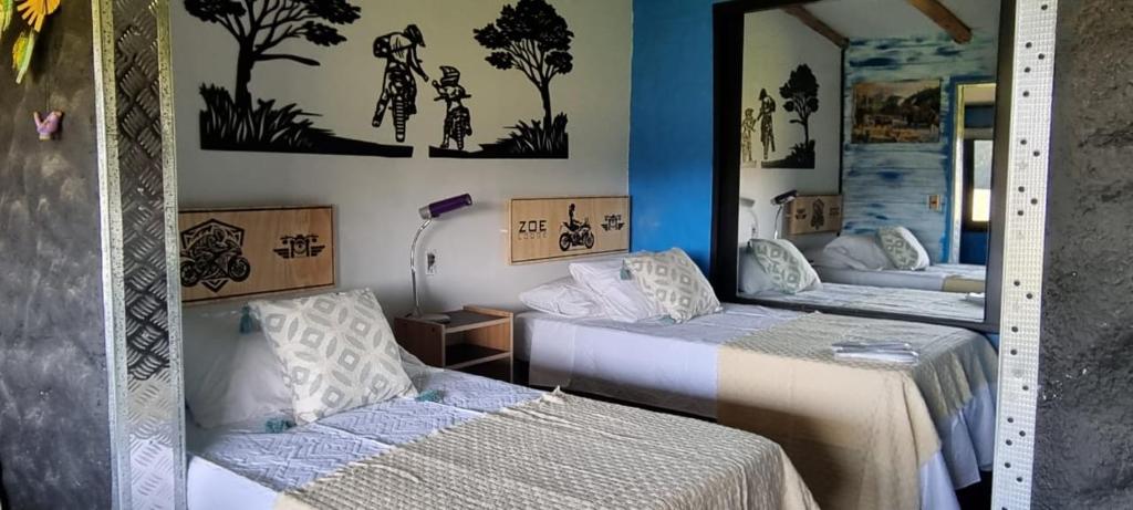 Posteľ alebo postele v izbe v ubytovaní ZOE LODGE