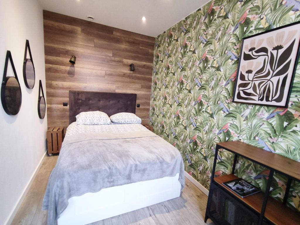 Posteľ alebo postele v izbe v ubytovaní Boho Apartments