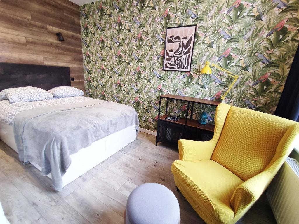 Posteľ alebo postele v izbe v ubytovaní Boho Apartments