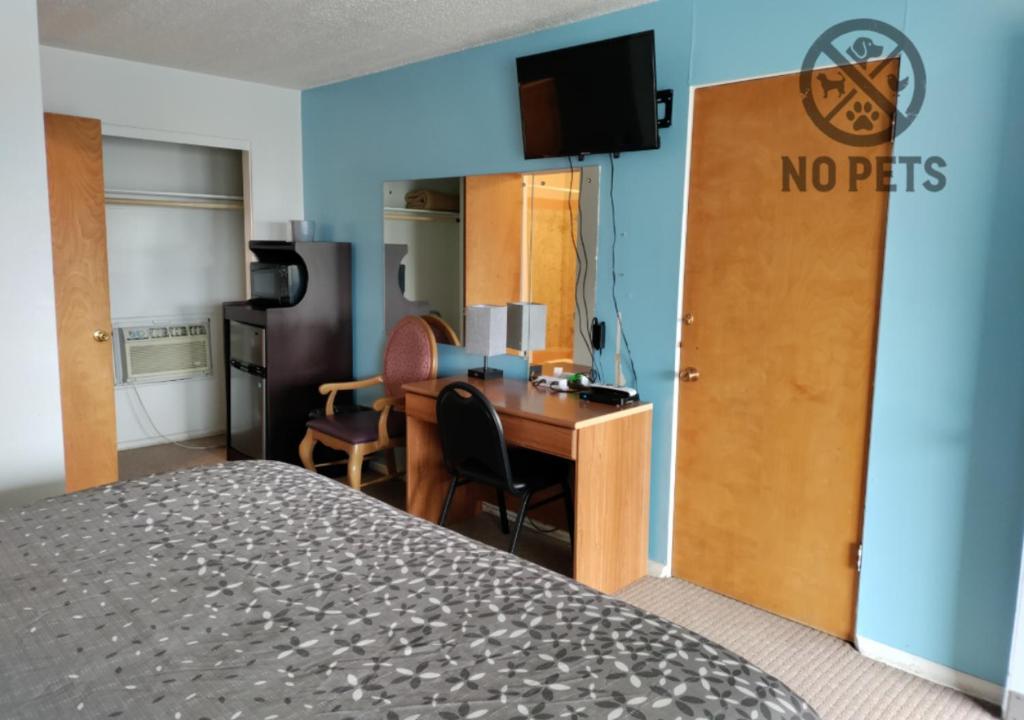 Kuchyň nebo kuchyňský kout v ubytování Eight Bar B Motel