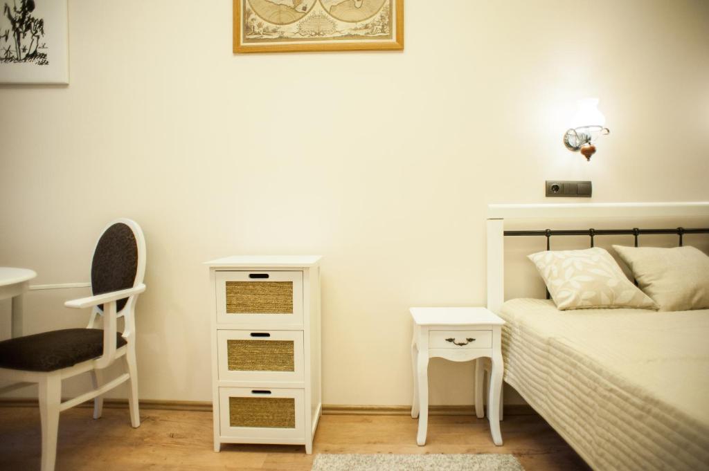 Posteľ alebo postele v izbe v ubytovaní All In Apartman II.