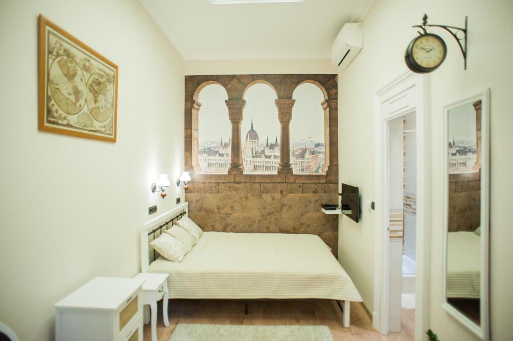 Posteľ alebo postele v izbe v ubytovaní All In Apartman II.