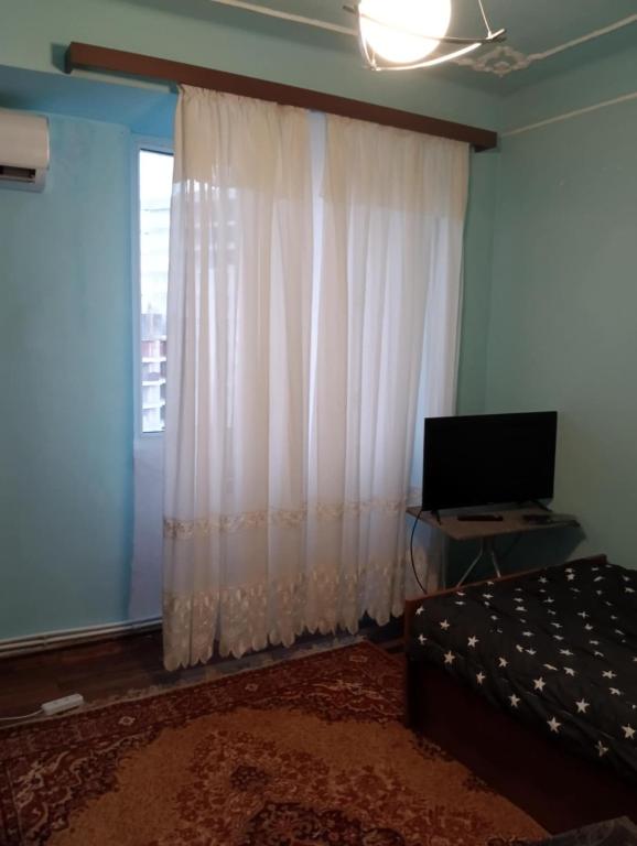 TV a/nebo společenská místnost v ubytování Guest House Armina