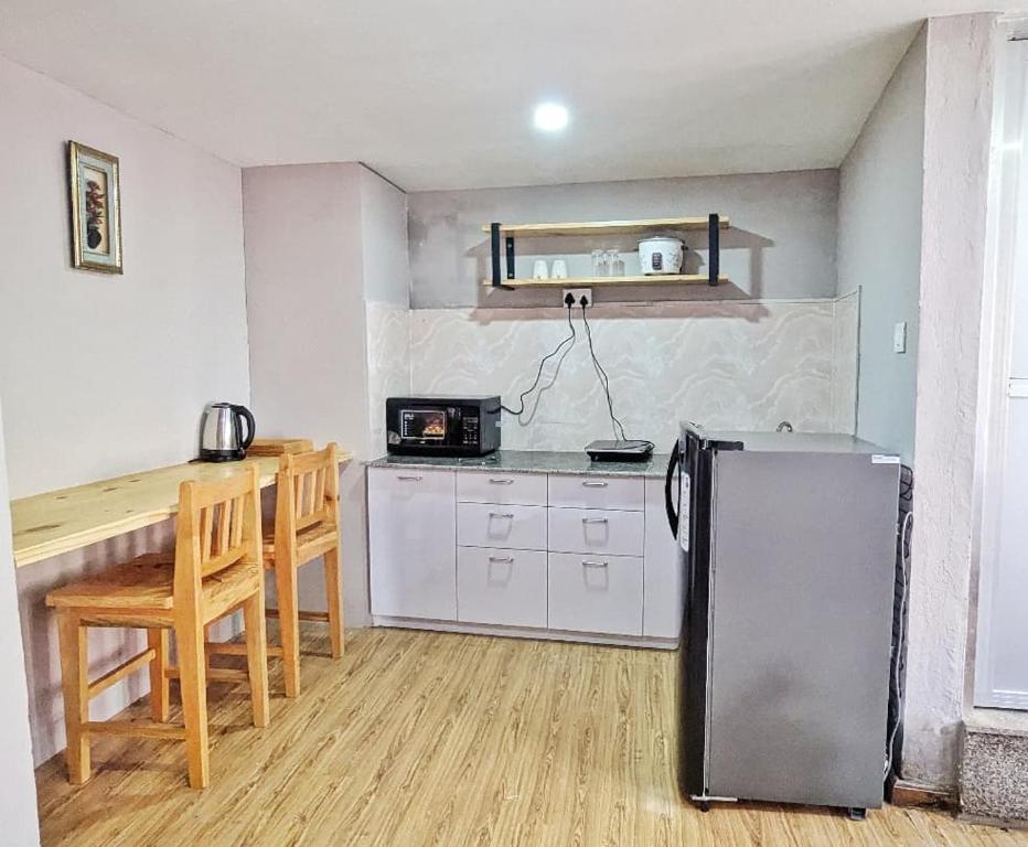 Kuchyň nebo kuchyňský kout v ubytování Nyadha House Bed & Breakfast