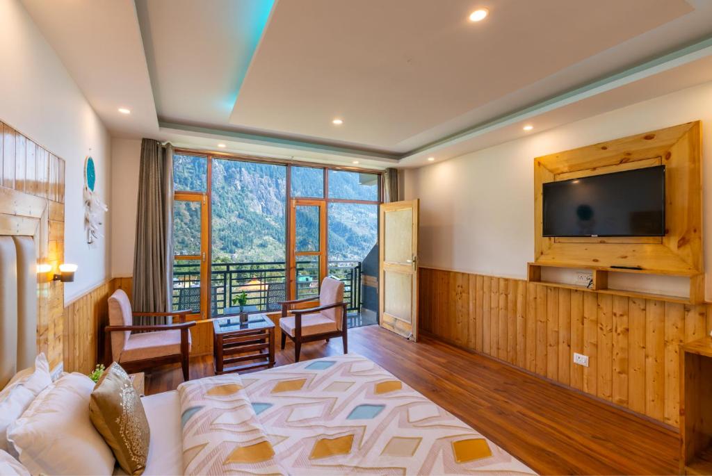 TV o dispositivi per l'intrattenimento presso The 14 Gables, A Boutique Stay - Pet Friendly Hotel
