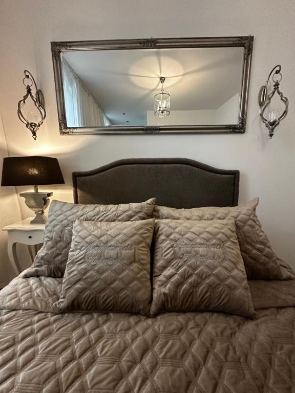 Posteľ alebo postele v izbe v ubytovaní Apartamencik Królewiecka